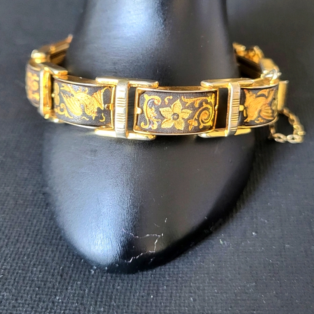 Elegant Gold and Black Floral Bracelet